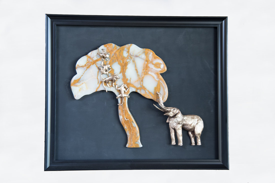 Bronze and onyx stone African elephant sculpture